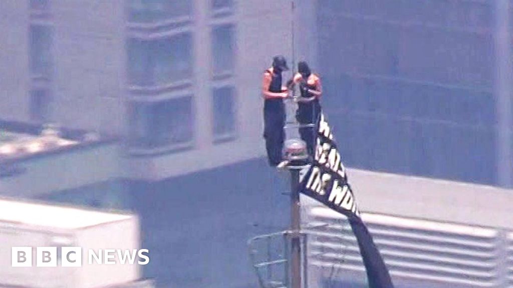 Two people climb to highest point of Empire State Building