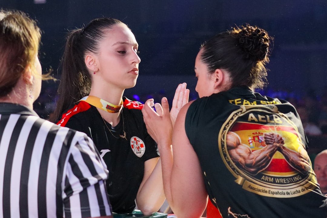 Female arm wrestlers face off before a competition.