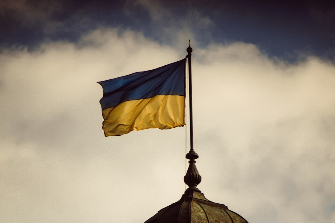 A flag is flying on top of a building