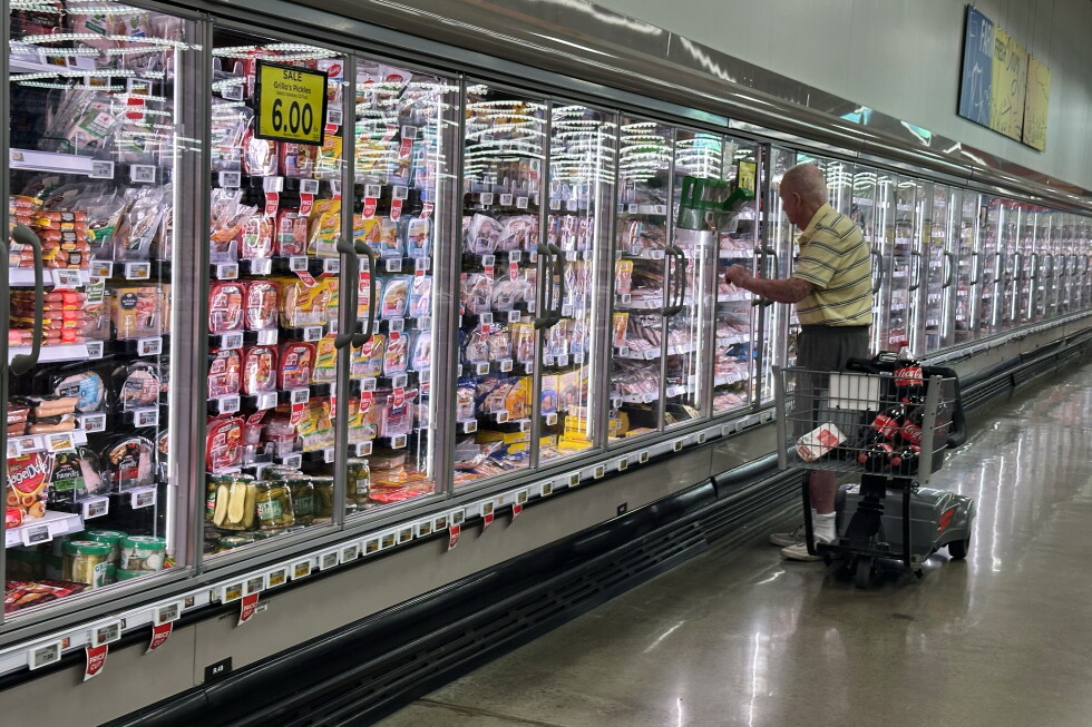 Oil price surge to $100 hits consumers at gas pumps and grocery stores