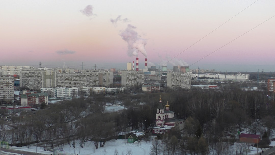 a city with a lot of smoke coming out of it