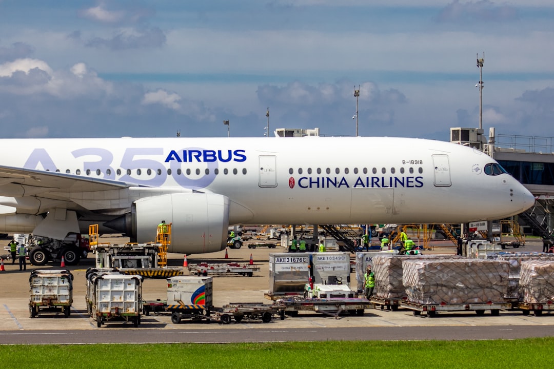 a large jetliner sitting on top of an airport tarmac