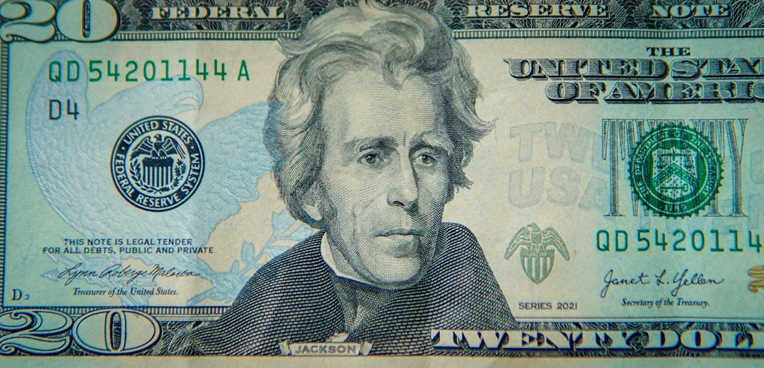A twenty-dollar bill featuring andrew jackson's portrait