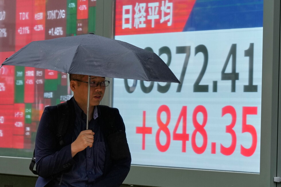 Asian shares mostly rise as AI leads rally on Wall Street
