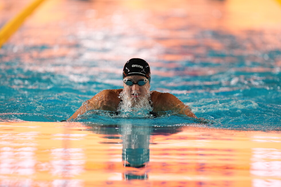 Kate Douglass sets 50 free world record in Pan Pacific prelims