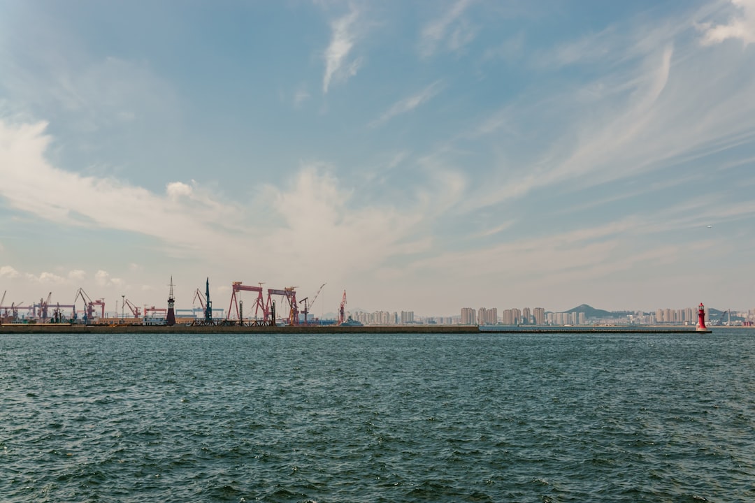 A large body of water with a sky background