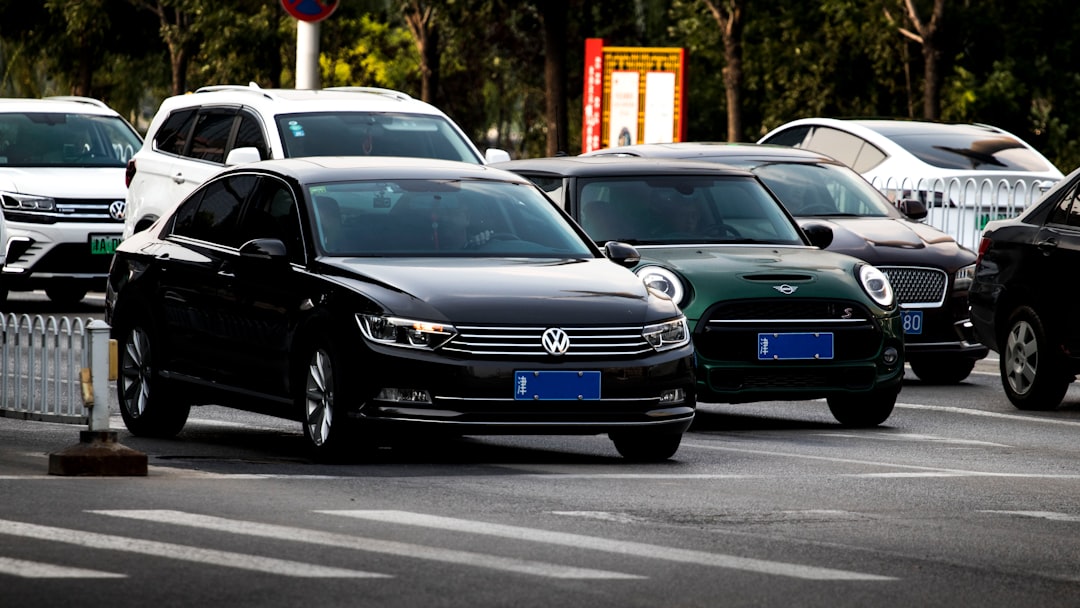 a group of cars parked in a parking lot