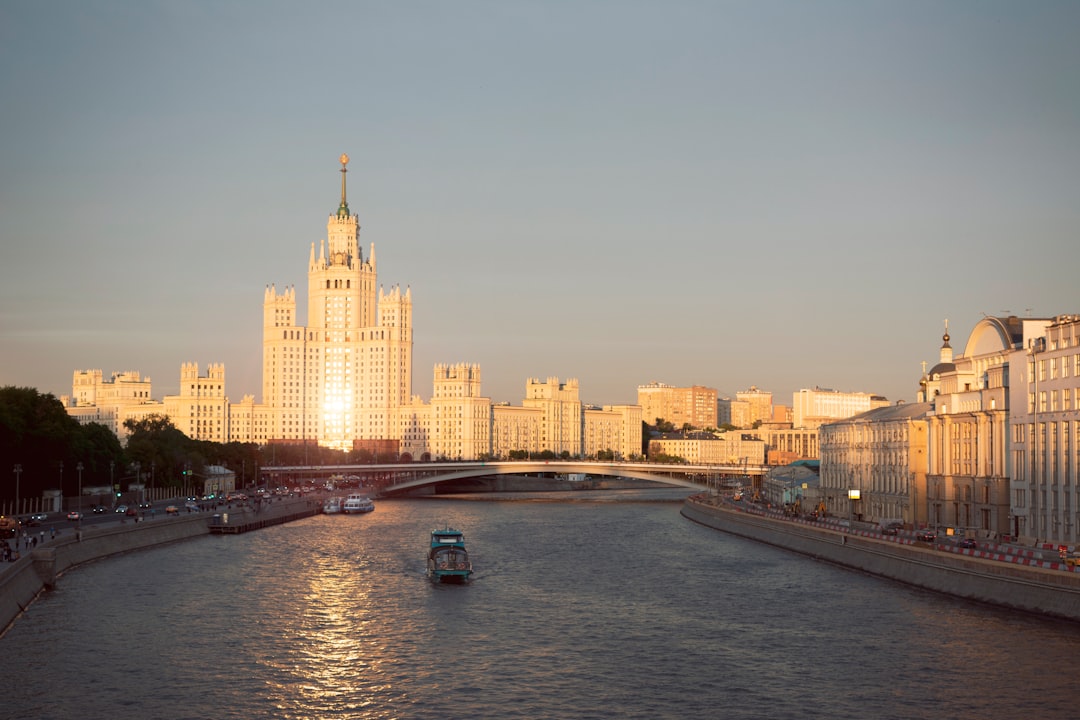 a river with a city in the background