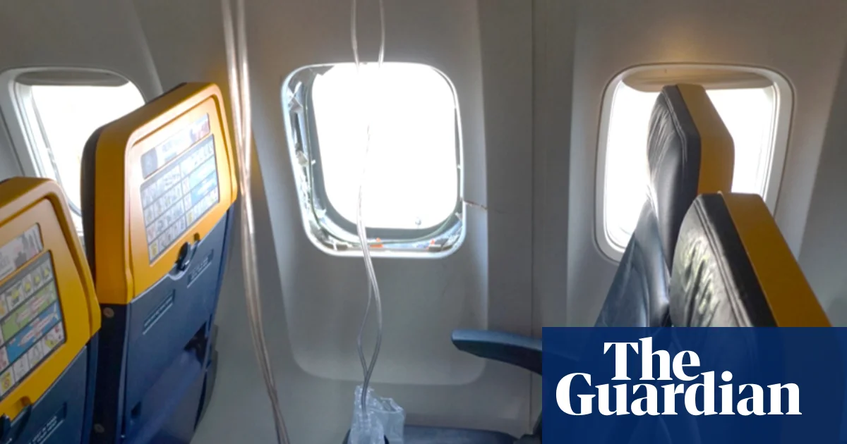 Engine parts shattered Ryanair window that passenger was partly sucked out of, report says