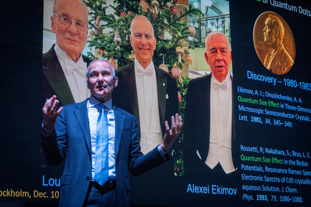 Speaker presents nobel laureates on screen