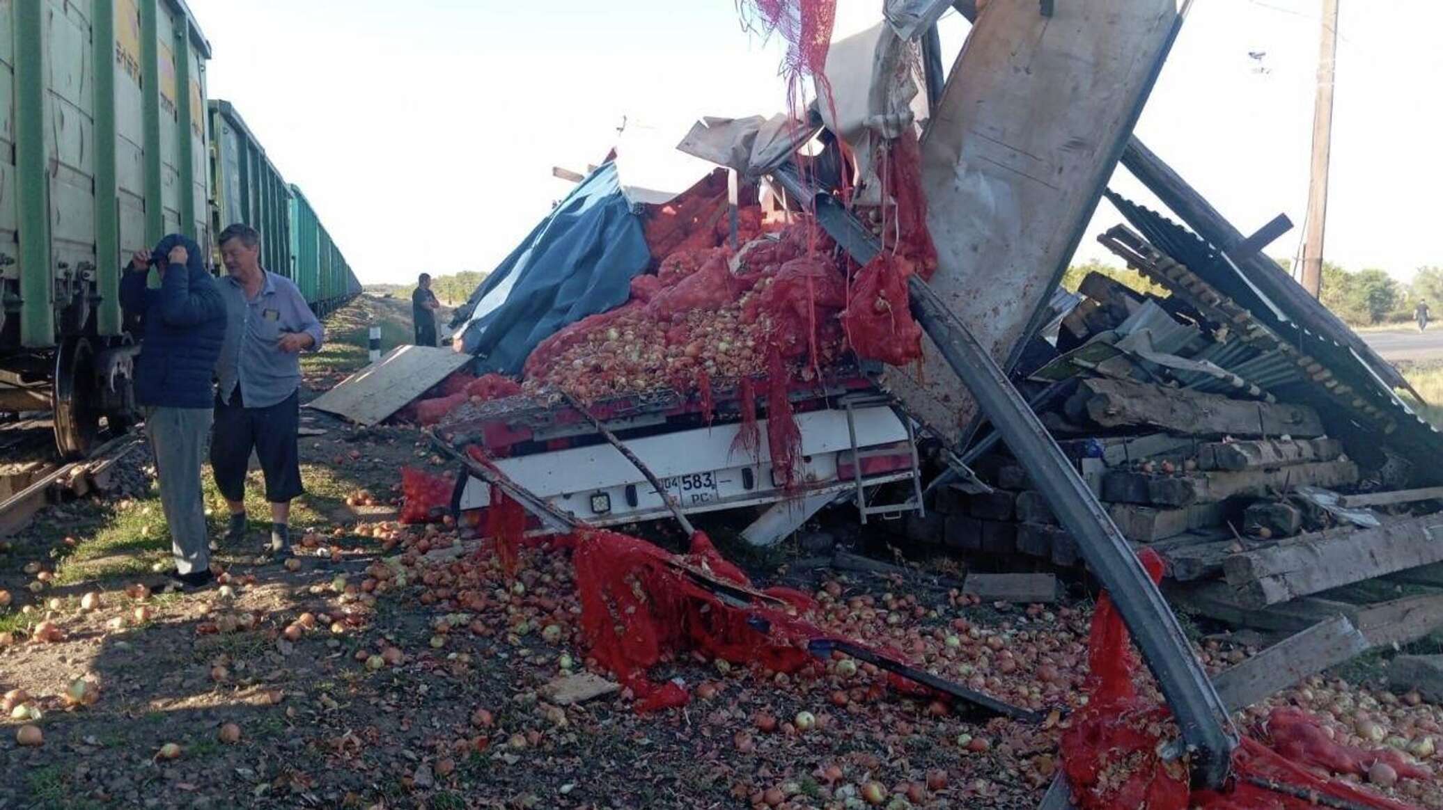 Truck collides with train in Akmola region: 23 tons of onions scattered