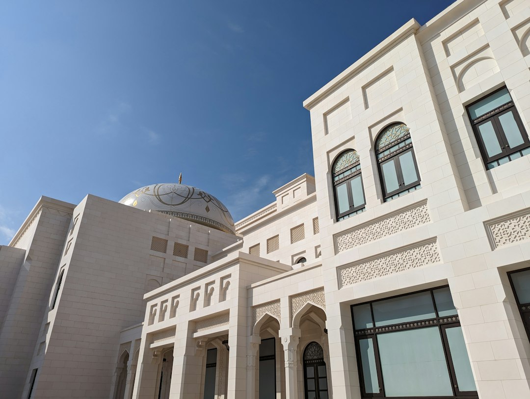 a large white building with a dome on top of it