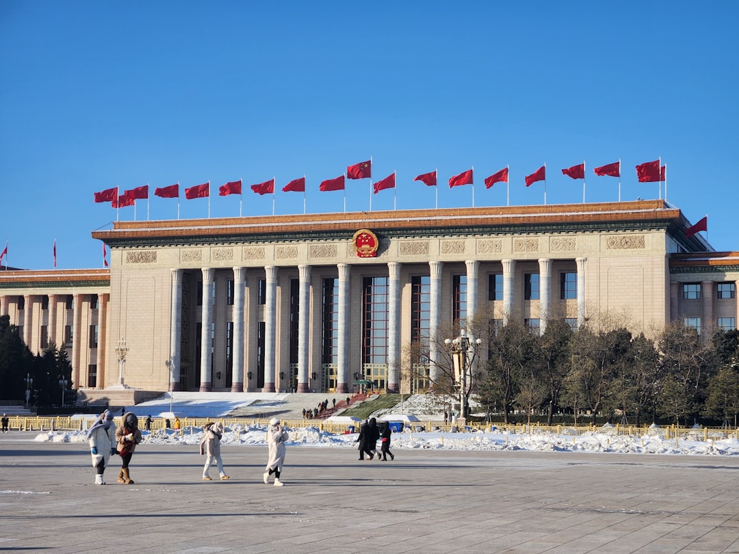 A group of people standing in front of a building