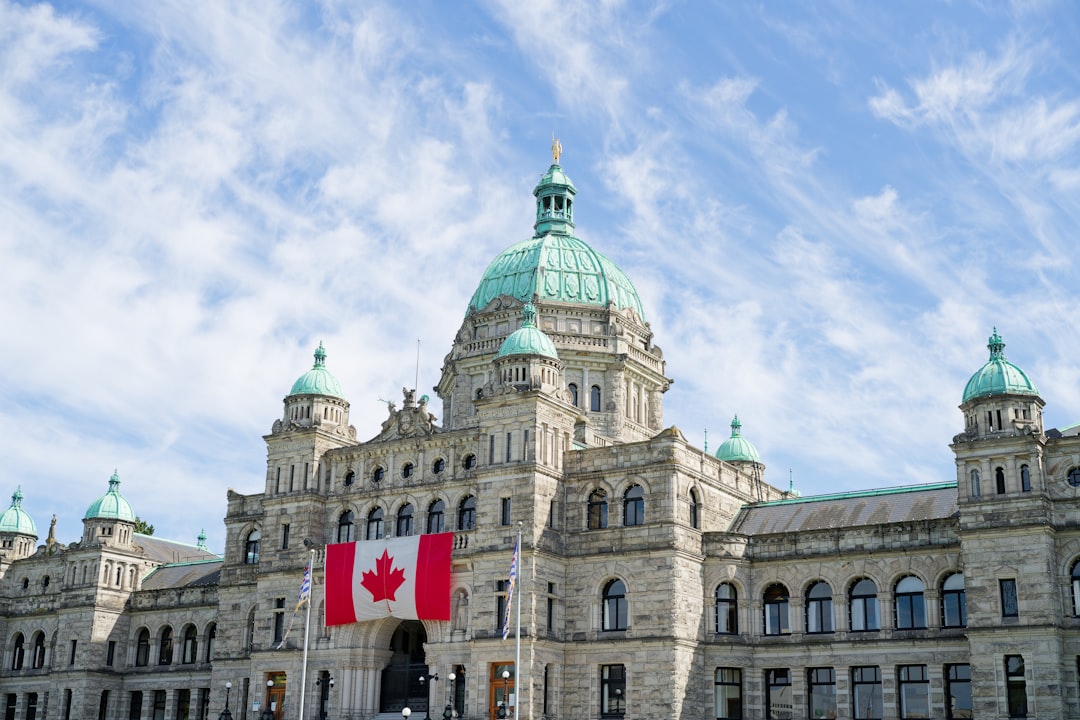 The british columbia parliament buildings display the canadian flag