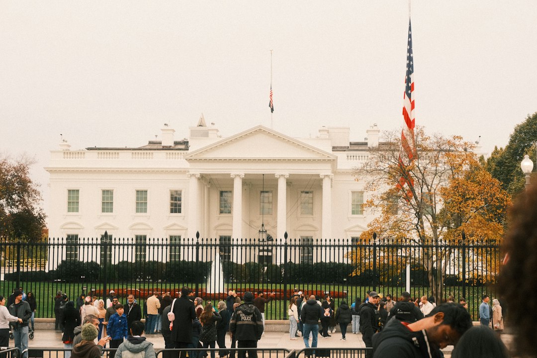 The white house with a crowd gathered outside