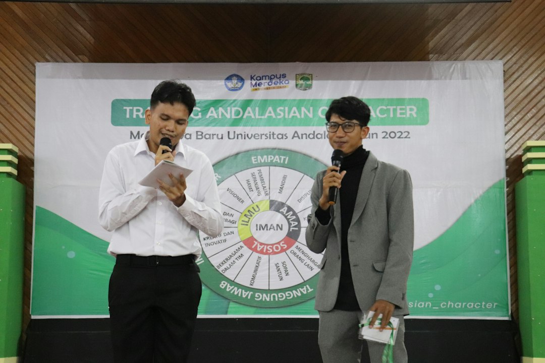 a couple of men holding microphones
