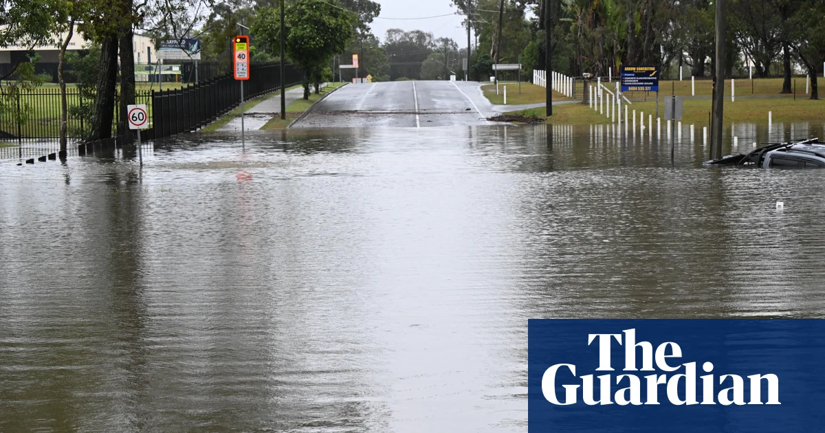 Man found dead in Queensland floodwaters as state hit by days-long deluge