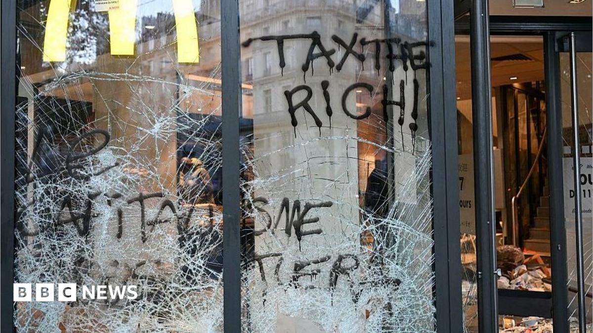 Paris riots leave burnt cars and shattered glass, 1,800 arrested