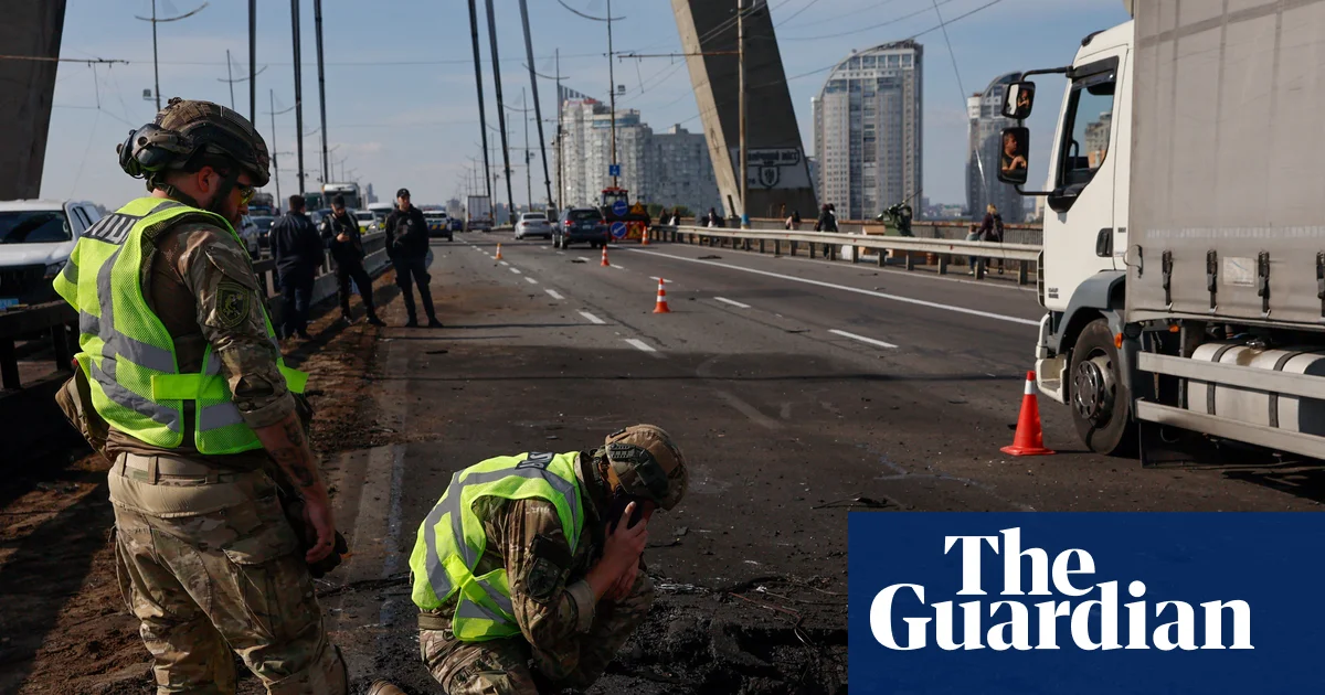 Russia strikes Kyiv bridge as German chancellor visits Ukraine